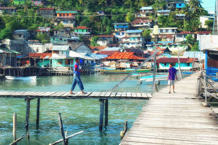 Jayapure, Indonesia - 9 October 2008: Traditional living area in Jayapura, Indonesiaの写真素材