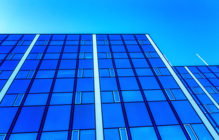 Modern glass facade building, Amsterdam, The Netherlandsの写真素材