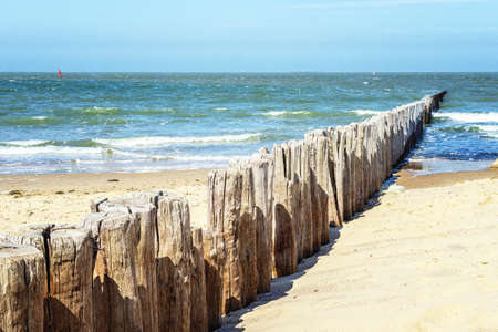 Wavebreakers Cadzand beach in the Netherlandsの写真素材