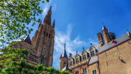 Afternoon view of the beautiful, medieval Church of Our Lady in Bruges, Belgiumの写真素材
