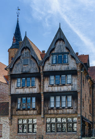 Traditional colorful Belgian facades of houses with tiled roofs in Bruges.のeditorial素材