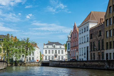 Scenery with water canal in Bruges, Venice of the North, cityscape of Flanders, Belgiumのeditorial素材