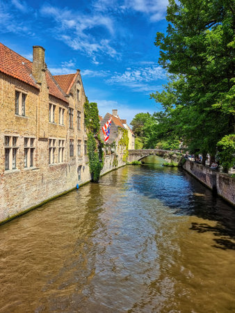 Scenery with water canal in Bruges, Venice of the North, cityscape of Flanders, Belgiumのeditorial素材