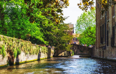 Scenery with water canal in Bruges, Venice of the North, cityscape of Flanders, Belgiumのeditorial素材