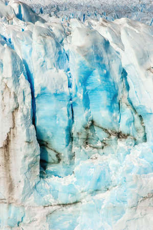 Perito Moreno Glacier in Los Glaciers National Park in Patagonia, Argentina. Blue Ice Glacier, Ancient Ice, El Calafate, Patagonia. Blue ice close up, ice background.の写真素材