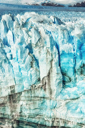 Perito Moreno Glacier in Los Glaciers National Park in Patagonia, Argentina. Blue Ice Glacier, Ancient Ice, El Calafate, Patagonia. Blue ice close up, ice background.の写真素材