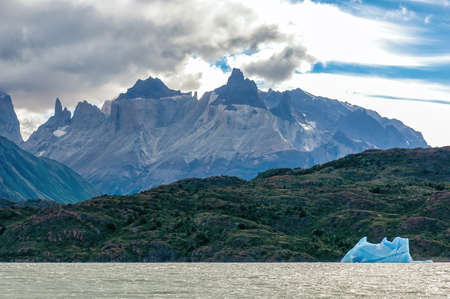 Ice from the glacier is floating on the lake in Torres del Paineの写真素材
