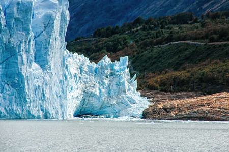 The Perito Moreno Glacier Calving into Lake (Lago) Argentino near El Calafate, Patagonia, Argentina.の写真素材