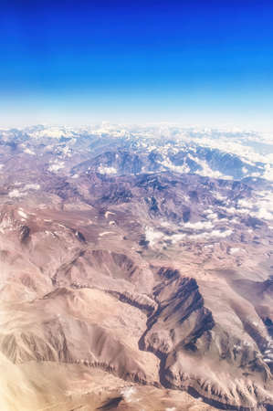 Andes Mountains (Cordillera de los Andes) viewed from an airplane window, near Santiago, Chile.の写真素材