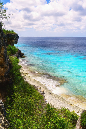 beautiful beach on the caribbean island of bonaire, good snorkel and dive site on the island. enjoy the relaxation in the sand by the seaの写真素材