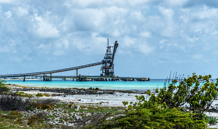 Conveyor belt for salt transportation as pier in sea on Bonaireの写真素材