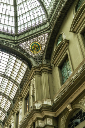 Guayaquil, Ecuador - September 26, 2022: Interior patio of the Municipality building, seen from outside, with it`s columns, statues, glass ceilings and beautiful decorations..のeditorial素材