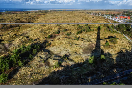 Shadow of the Lighthouse in Ameland, The Netherlandsの写真素材