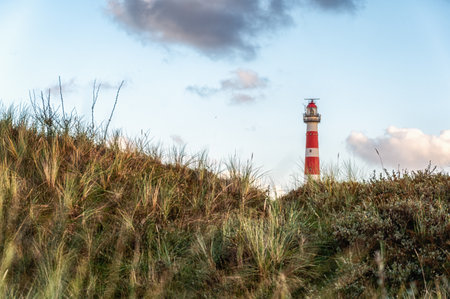 The beautiful lighthouse of Ameland (the Bornrif). Lighthouse Bornrif is an imposing sight on the island of Ameland, The Netherlandsの写真素材