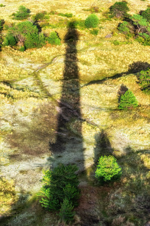 Shadow of the Lighthouse in Ameland, The Netherlandsの写真素材