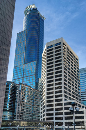 cityscape of modern architecture glass skyscrapers towers high-rises and skyway in minneapolis minnesotaの写真素材