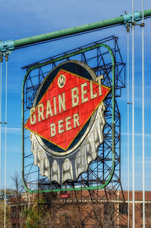 Minneapolis, Minnesota - October 31, 2022: Grain Belt Beer sign over Nicollet Island in downtown Minneapolis. Grain Belt beer is brewed in the state of Minnesota by the August Schell Brewing Company.のeditorial素材