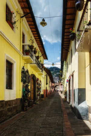 Beautiful street view of the famous Calle de la Ronda in the historical center in Quitoの写真素材