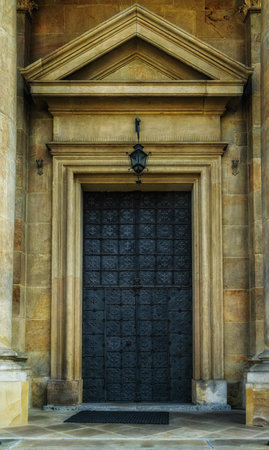 Metal medieval beautiful door. Church of the Conversion of Saint Paul in Krakow, Poland.の写真素材