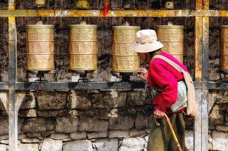 Prayer wheels in Potala palace, former Dalai Lama residence in Lhasa in Tibet. The Potala Palace is a dzong fortress in the city of Lhasa, in Tibet.のeditorial素材
