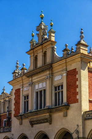 Facade of Cloth Hall or Sukiennice building on main market square of Krakow old town, Poland.のeditorial素材