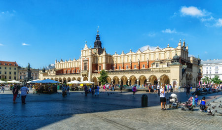 Krakow, Poland - 12 August 2022:Sukiennice building with Town Hall in the backgroundのeditorial素材