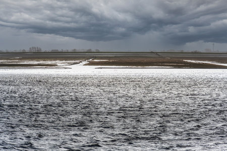 Maritime mudflat landscape in low tide water, Waddenzee, Friesland, The Netherlandsの写真素材