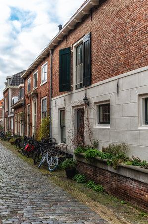 Street with old houses in Haarlem, Netherlandsの写真素材