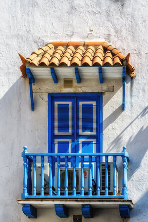 Blue and white typical balcony in the city of  Cartagena de las Indias, Colombiaの写真素材