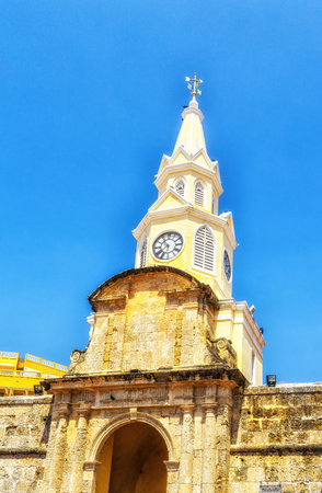 The historic clock tower gate is the main entrance into the old city of Cartagena, Colombiaの写真素材