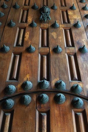 A large ornate door on the famous cathedral in the main square of Lima, Peru.の写真素材