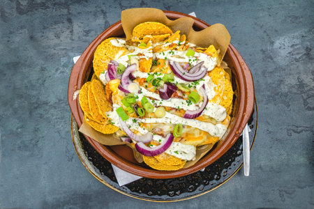 Nachos chips on wooden background. Top view.の写真素材