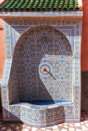 Copper faucet with drinking water on a street in medina, Morocco, Africaの写真素材