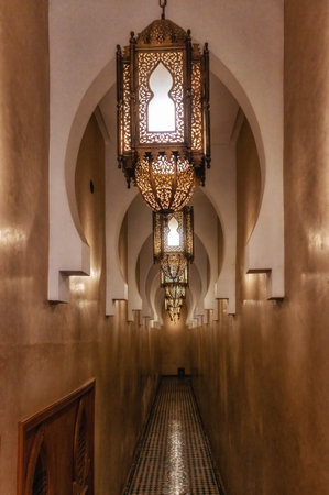 Beautiful hallway corridor Morocco architecture style. Lamp, tile and painting are unique Morocco style.の写真素材