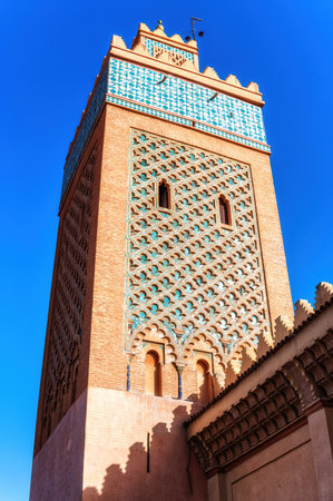 Minaret of the Kasbah Mosque, also known as the Mosque of Moulay al-Yazid, in Marrakech, Moroccoの写真素材