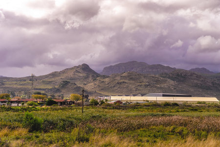 View of a winery with mountains in the background, South Africaの写真素材