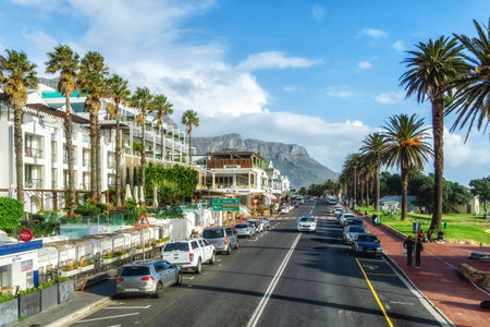 Cape Town, South Africa, June 19, 2023: Street of Camps Bay with lots of resturants and cafesの写真素材