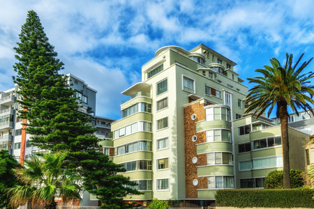 Seaside residence and boulders at Clifton Beach , an exclusive residential area and home to some of the most expensive real estate in South Africaの写真素材