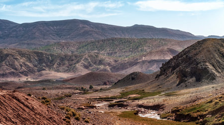 Morocco High Atlas Mountain range. Morocco High Atlas Mountain range. Spring time. Blue sky. Bright sunshine.の写真素材