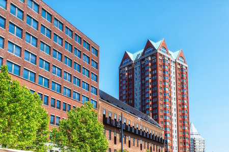 Modern skyscraper and residential buildings in Rotterdam, Netherlandsの写真素材