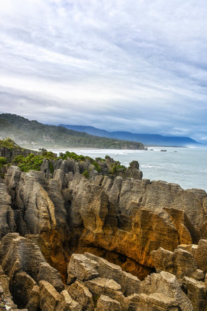 Pancake Rock is a natural wonder of New Zealand. Incredible journey to the ends of the world. Stone flat "pancakes", stacked on top of each other.の写真素材