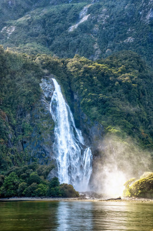Bowen Falls at Milford Sound, a UNESCO world natural heritage site, Fiordland National Park, South island, New Zealandの写真素材