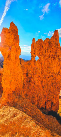 The famous Bryce Canyon National Park on a beautiful sunny day with blue sky and dramatic clouds, Utah, USA, North Americaの写真素材