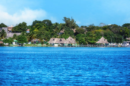Laguna de Bacalar Lagoon palapas in Mayan Mexico at Quintana rooの写真素材
