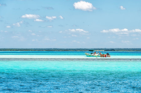 Bacalar, Mexico - February 27, 2024: Bacalar, Quintana Roo, Mexico, Tourists doing an excursion in a lagoon of Bacalarの写真素材
