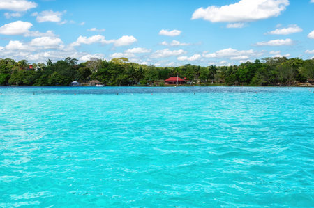 Laguna de Bacalar Lagoon palapas in Mayan Mexico at Quintana Rooの写真素材
