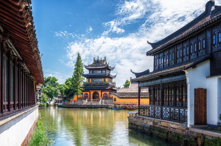 Chinese traditional architecture with boats on canal of Shanghai Zhujiajiao water town, Chinaの写真素材