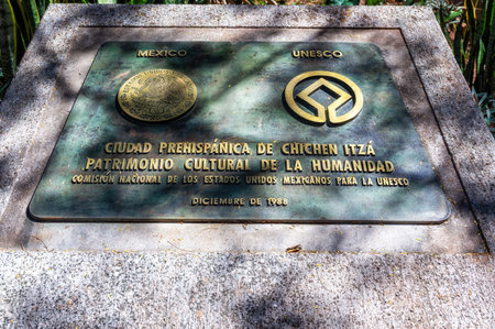 The plaque for Chichen Itza, Mexico, at the entrance to the site, Mexicoの写真素材