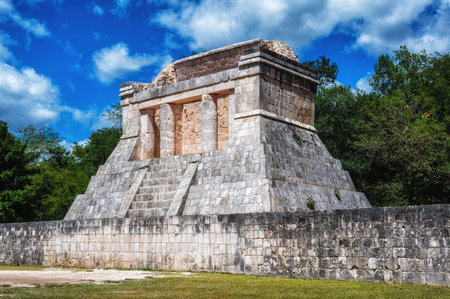 The Temple of the Bearded Man at the northern end of the Great Ball Court in Chichen Itza, Mexico. Chichen Itza was a large city built by the Maya people between AD 600â900. The archaeological site is located in YucatÃ¡n State, Mexico.の写真素材