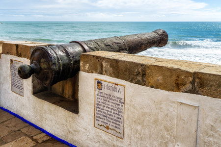 Old cannon overlooking Mediterannean Sea in Sitges (Spain)の写真素材